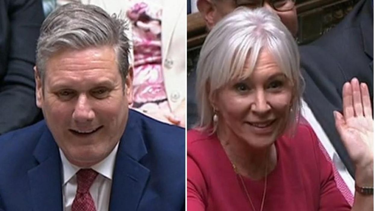 Nadine Dorries waves and mimes 'surprise' after Keir Starmer accuses her of 'hiding' during PMQs