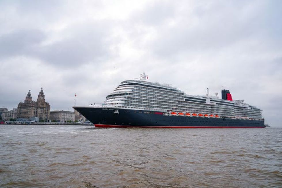 Cunard\u2019s Queen Anne sailing into the Mersey