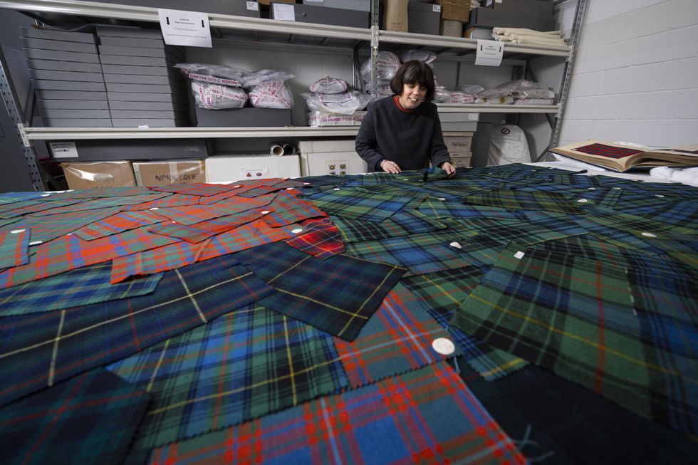 Curator with tartan samples
