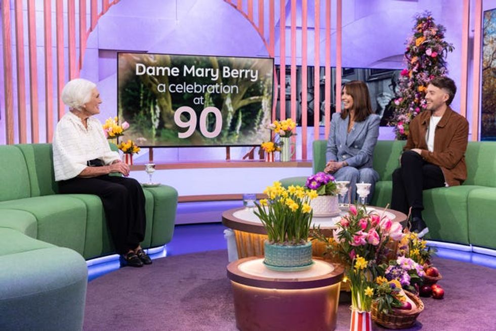 Dame Mary Berry with hosts Alex Jones and Roman Kemp during an episode of The One Show