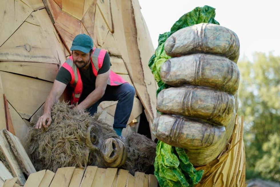Dan McGavin, Design Director from Bakehouse Factory, inspects a giant interactive gorilla sculpture \u2018Wilder\u2019, during it\u2019s unveiling to mark the final opening weeks of Bristol Zoo Gardens in Bristol. Picture date: Thursday July 21, 2022
