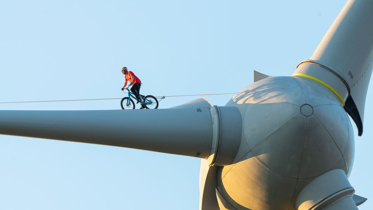 Danny Macaskill cycles across the turbine (The Climate Games/Danny MacAskill)