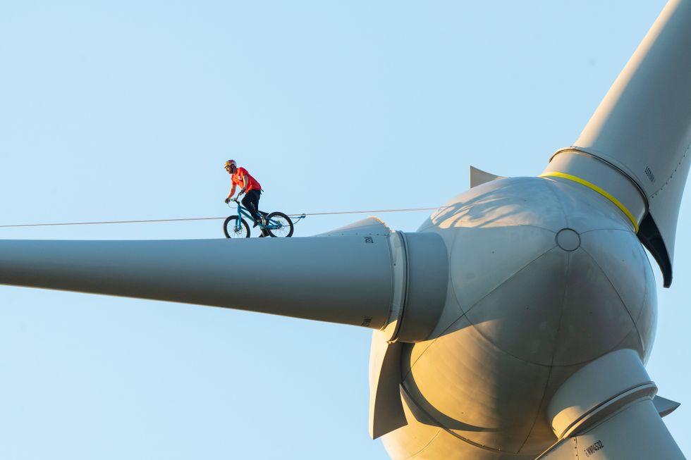 Danny Macaskill cycles across the turbine (The Climate Games/Danny MacAskill)