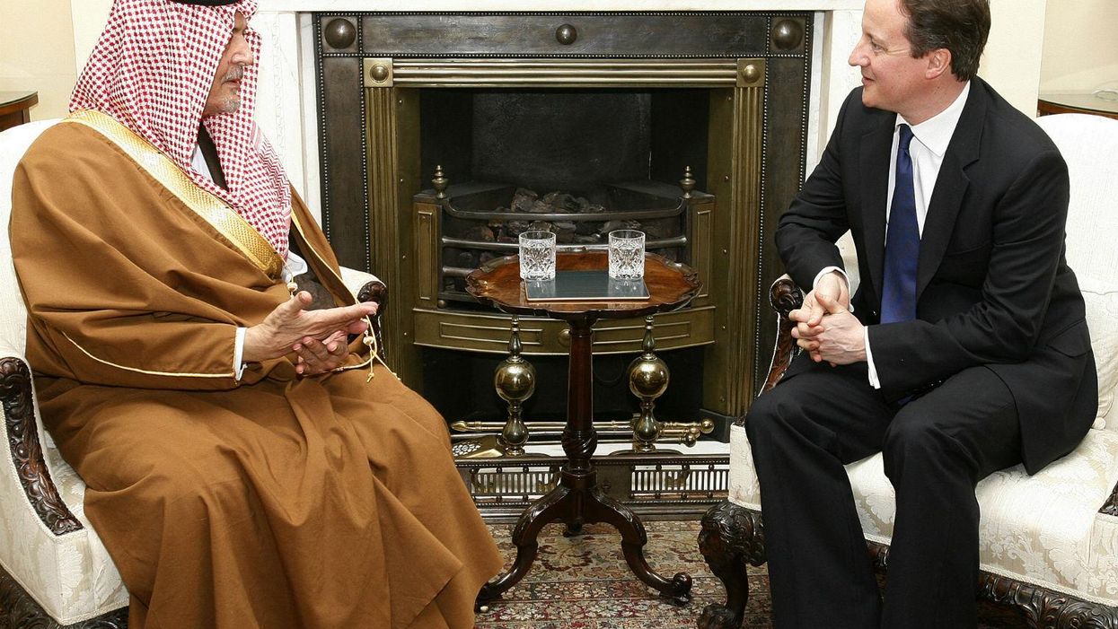 David Cameron with Saudi foreign minister Prince Saud al-Faisal in 2011