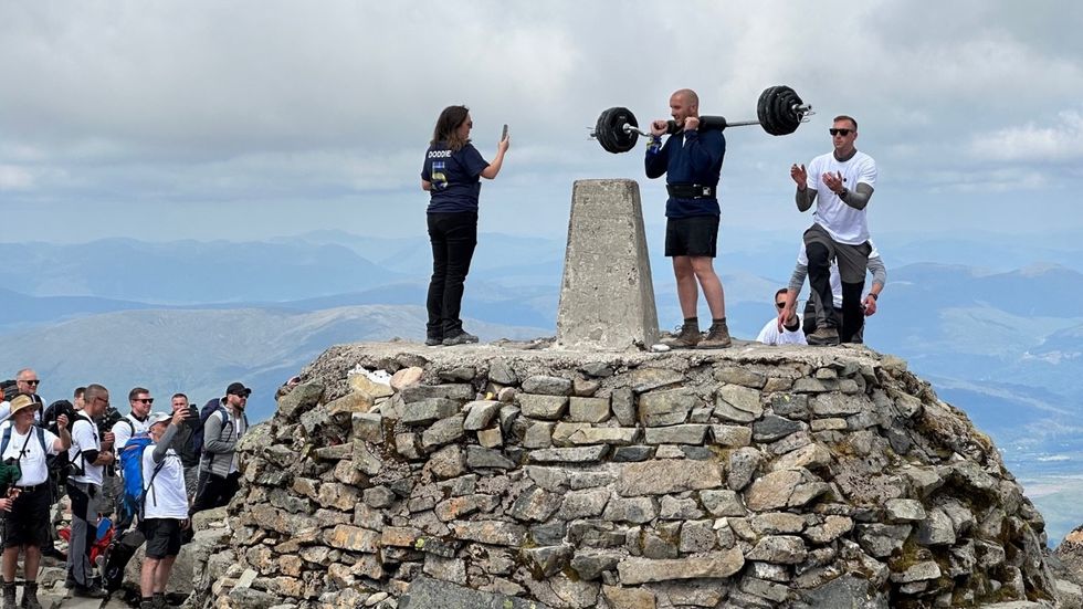 Man carries 100kg barbell up Ben Nevis to raise funds for MND research