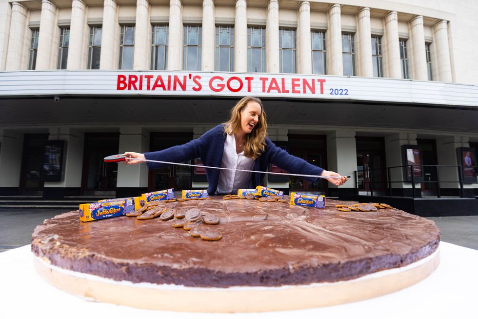 Former Bake Off champion unveils world’s largest Jaffa Cake