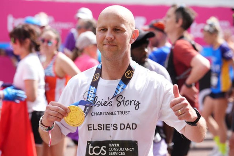 David Stancombe, the father of Southport attack victim Elsie Dot, after crossing the finish line during the TCS London Marathon.