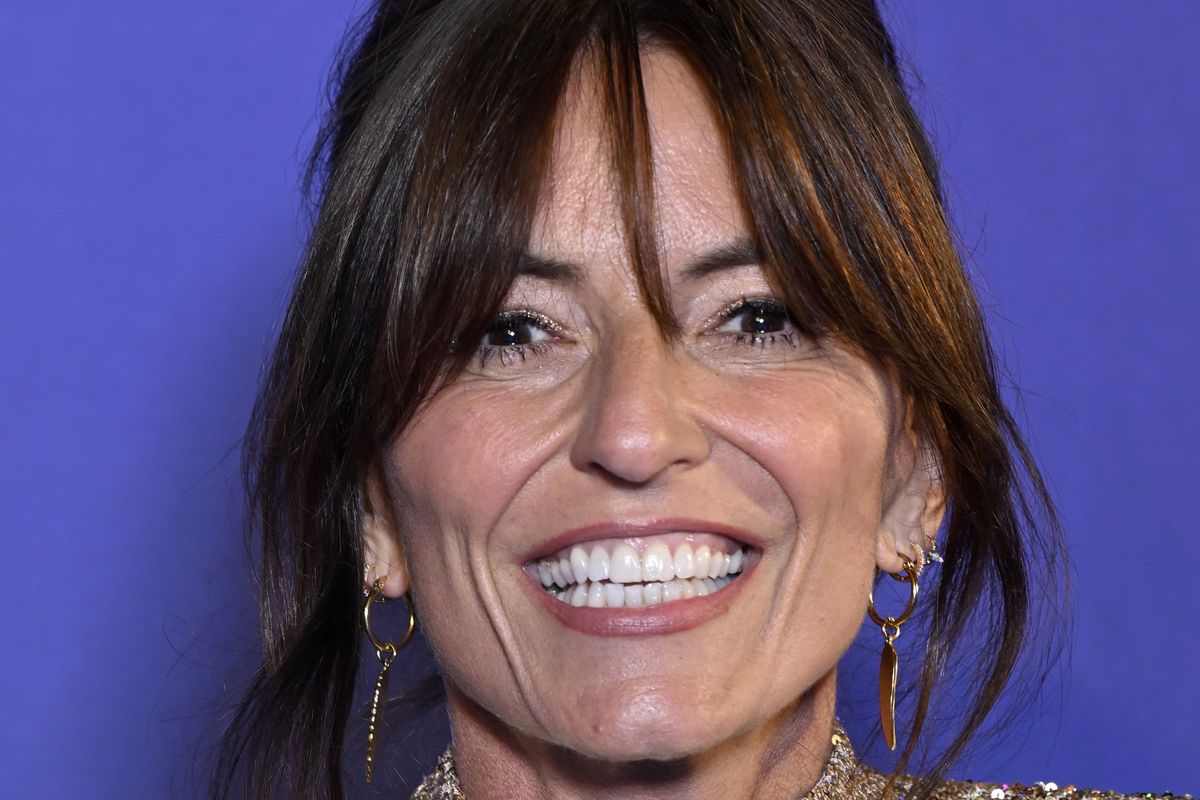 Davina McCall, a white woman with wavy brown hair.