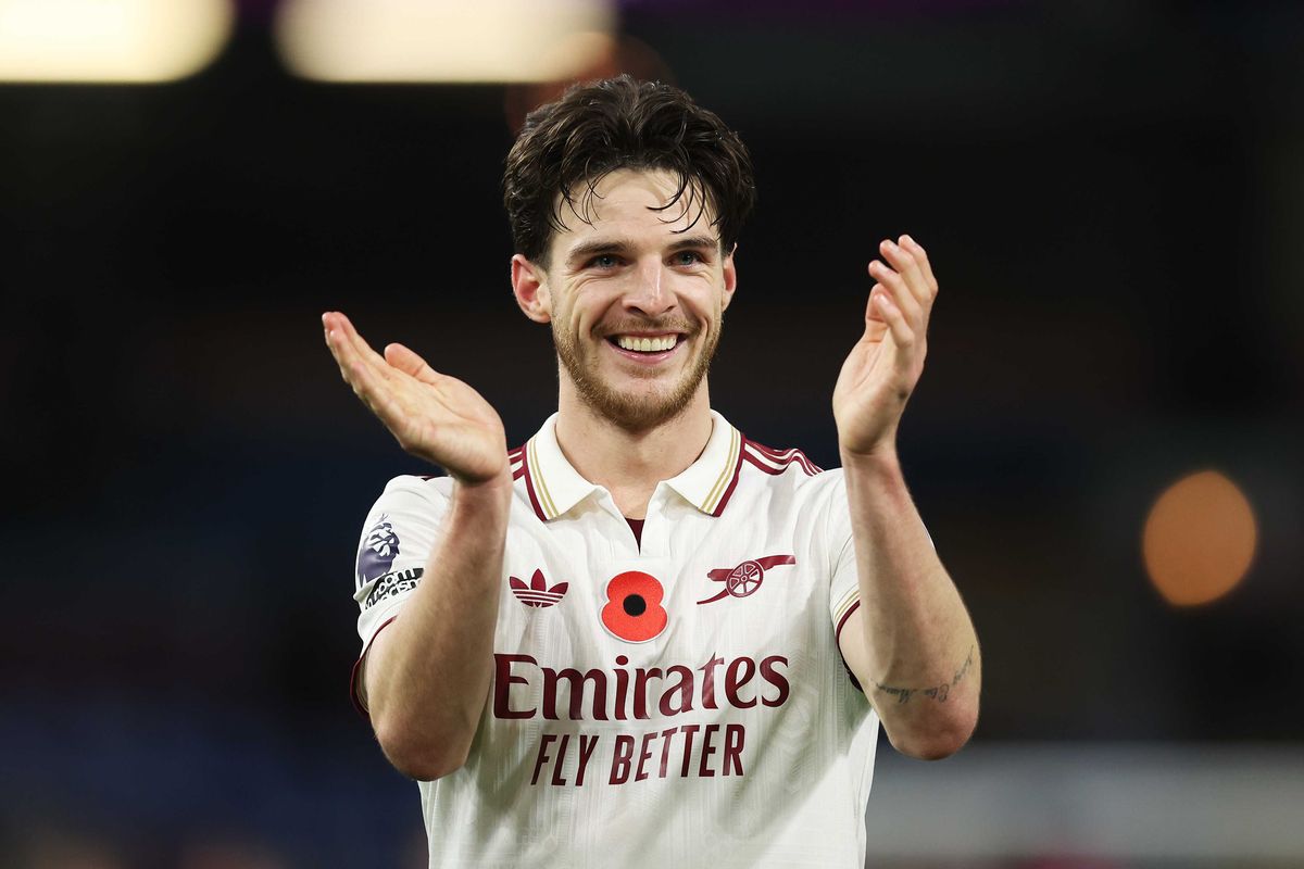 Declan Rice of Arsenal celebrates following the team's victory during the Premier League match between Burnley and Arsenal at Turf Moor on November 01, 2025 in Burnley, England