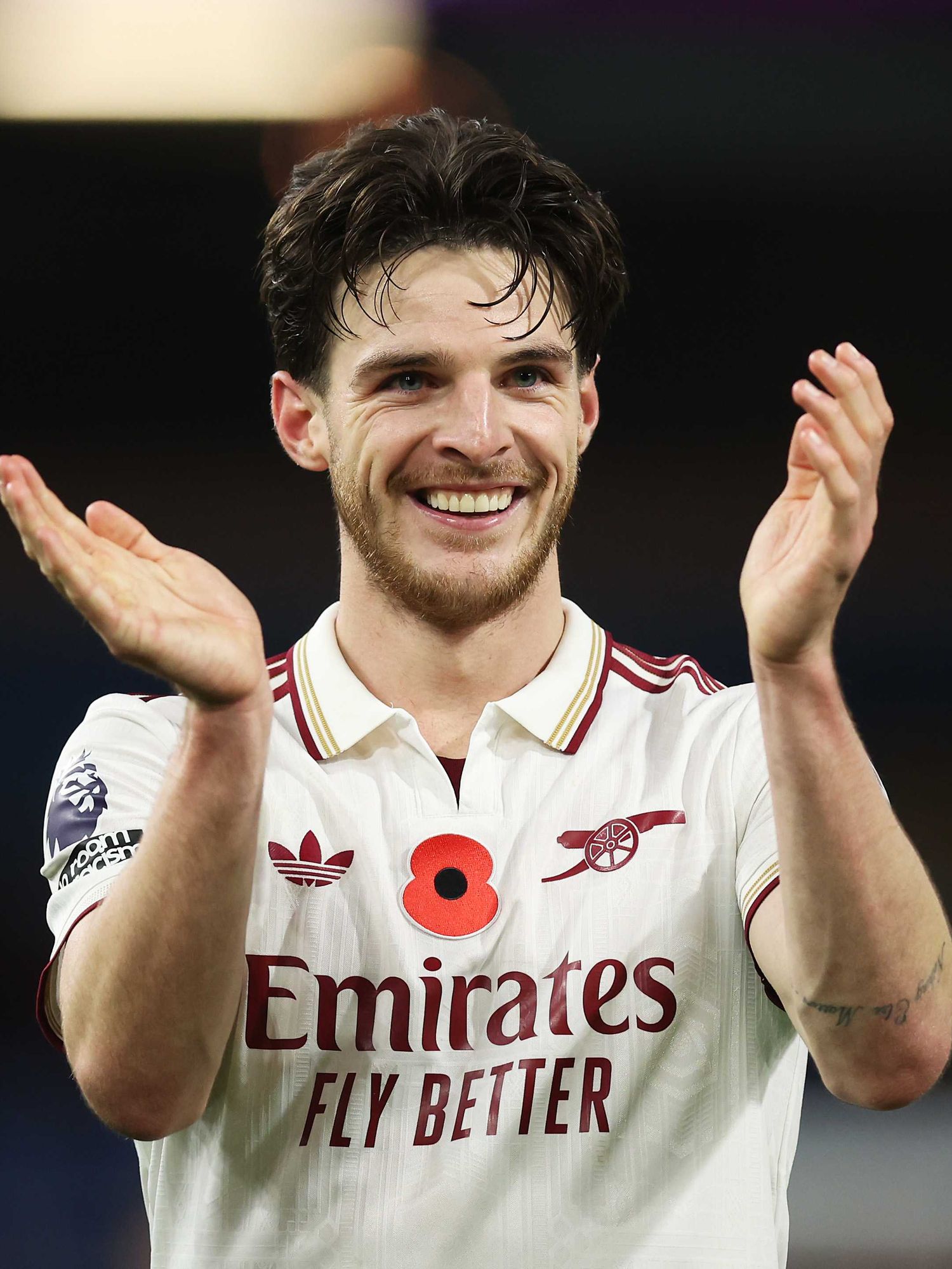 Declan Rice of Arsenal celebrates following the team's victory during the Premier League match between Burnley and Arsenal at Turf Moor on November 01, 2025 in Burnley, England