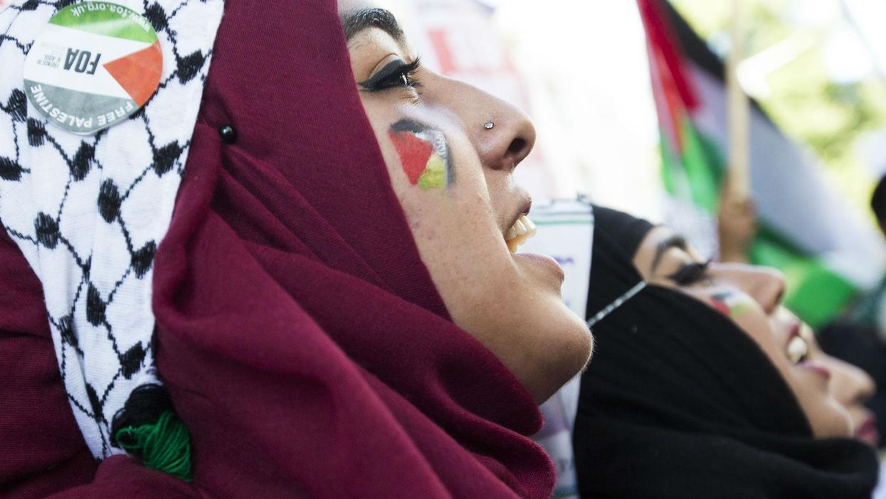Demonstrators hold a rally outside the Israeli Embassy in July 2014