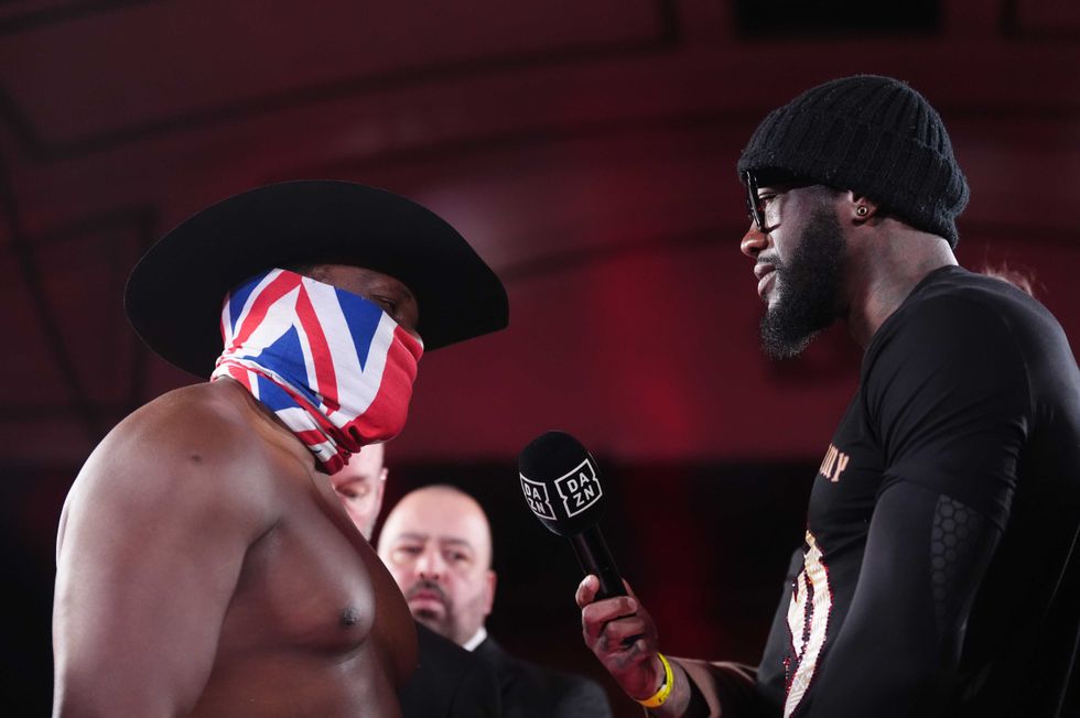 Derek Chisora and Deontay Wilder face off during a weigh in at York Hall, London