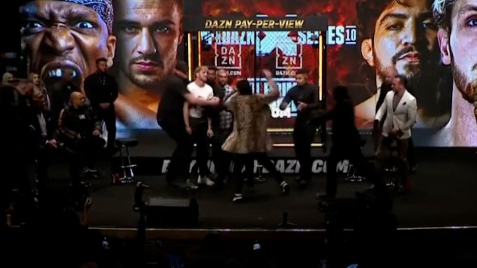 https://www.indy100.com/media-library/dillon-danis-strikes-logan-paul-with-microphone-in-chaotic-pre-fight-face-off.jpg?id=49681833&width=980