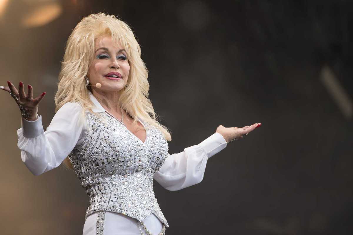 Dolly Parton performing on the Pyramid Stage at Glastonbury in 2014.