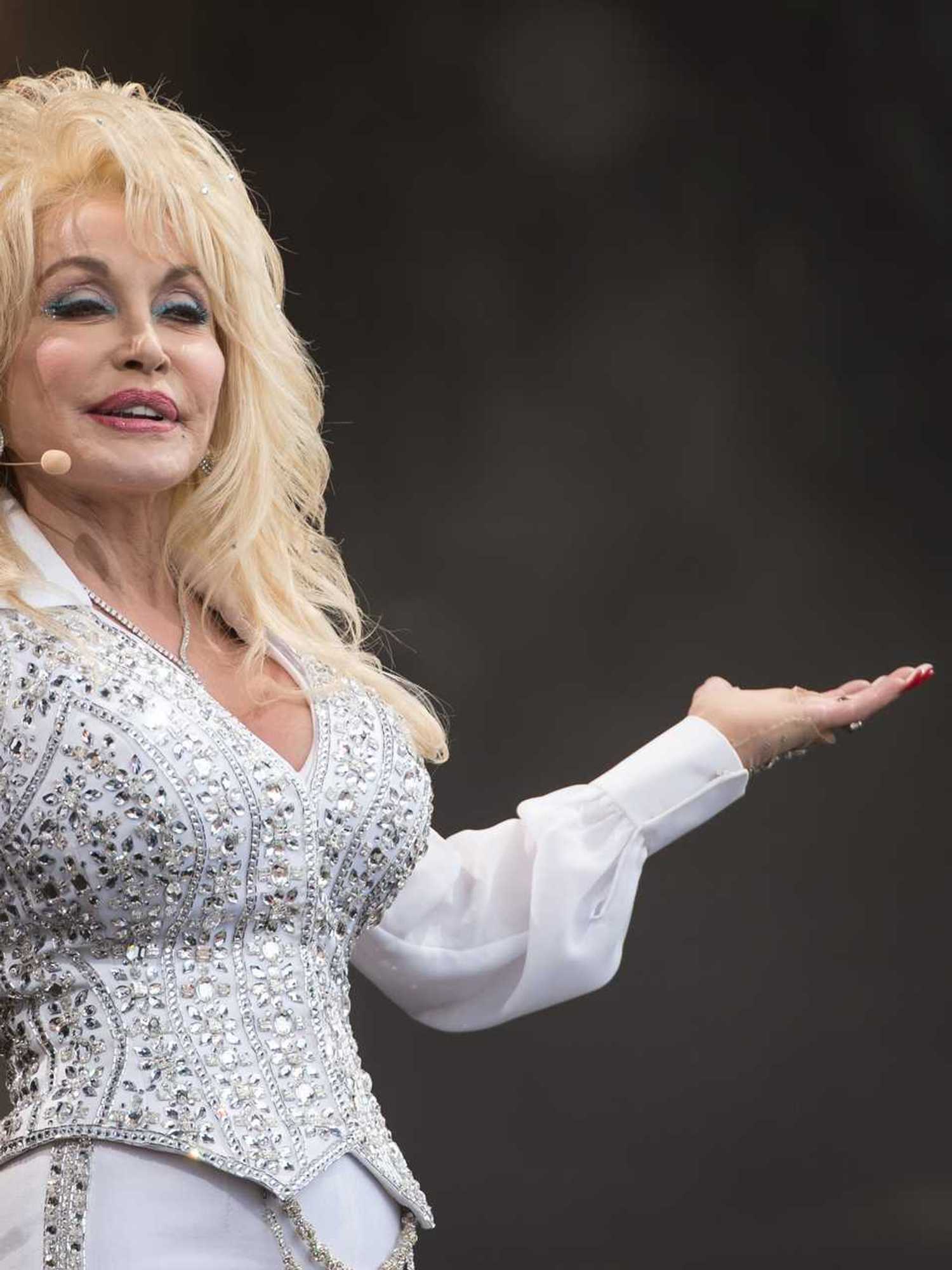 Dolly Parton performing on the Pyramid Stage at Glastonbury in 2014.