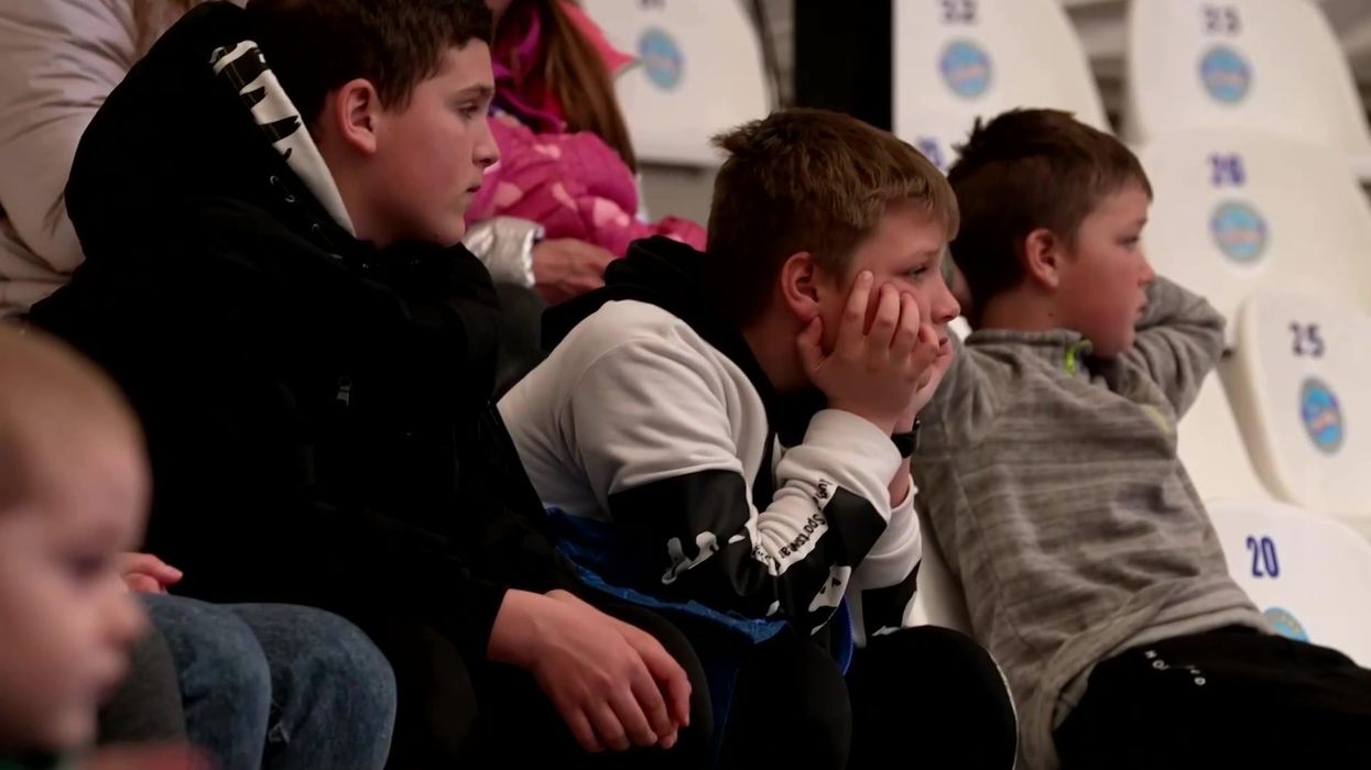 Ukrainian children fleeing war treated to dolphin show to boost morale