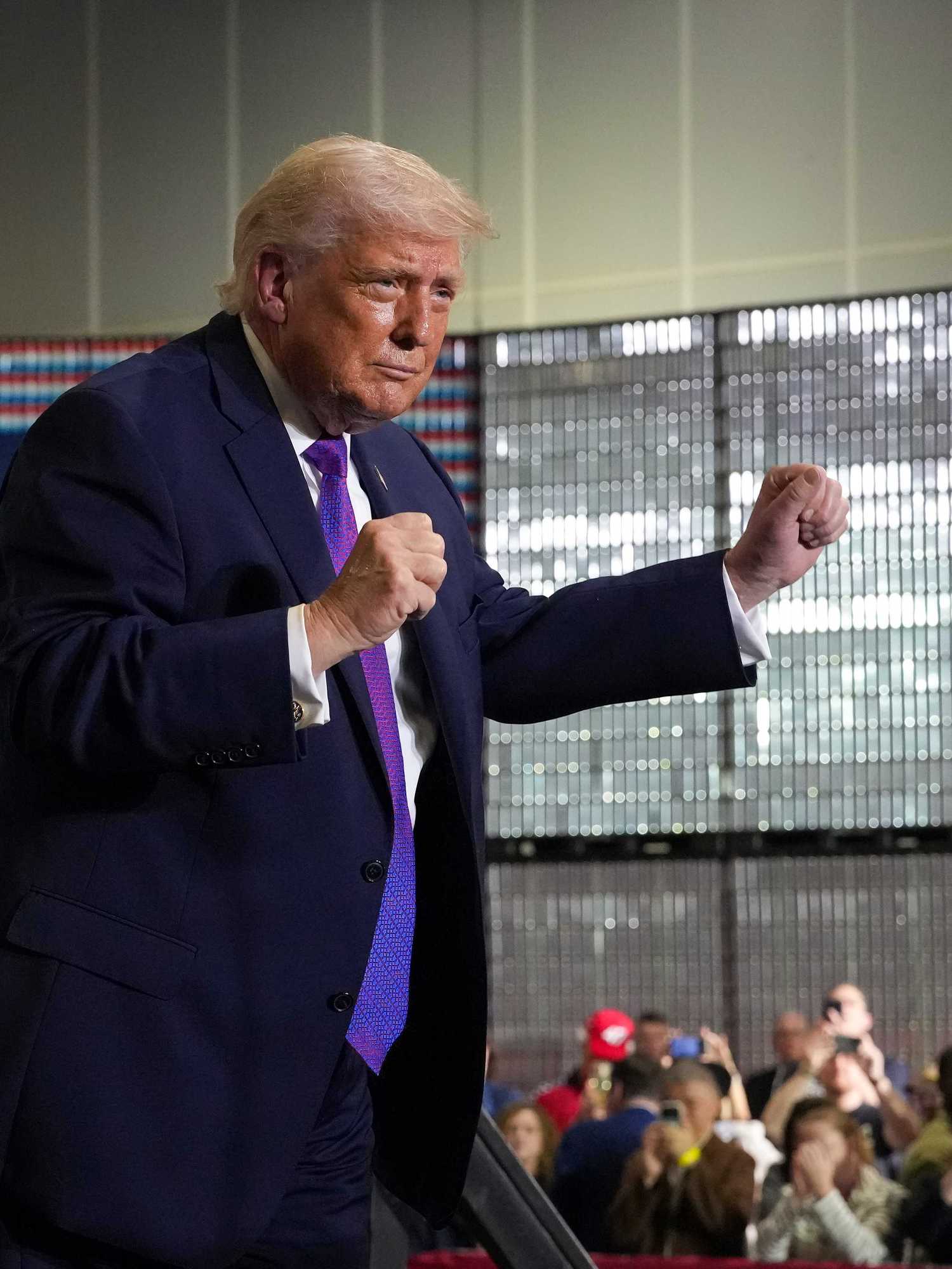 Donald Trump dances to the YMCA at a rally in Kentucky.