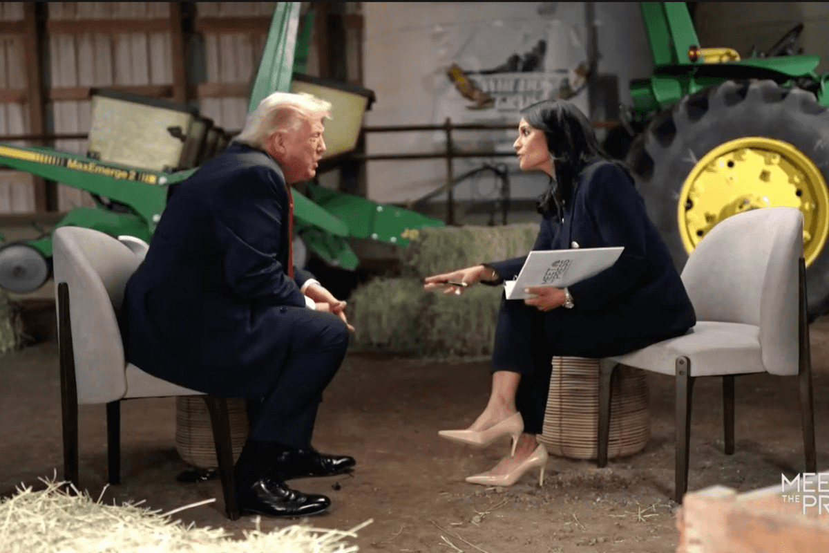 Donald Trump (left) and Kristen Welker (right) talk during a Meet the Press interview, with green tractors and hay bales visible around them.