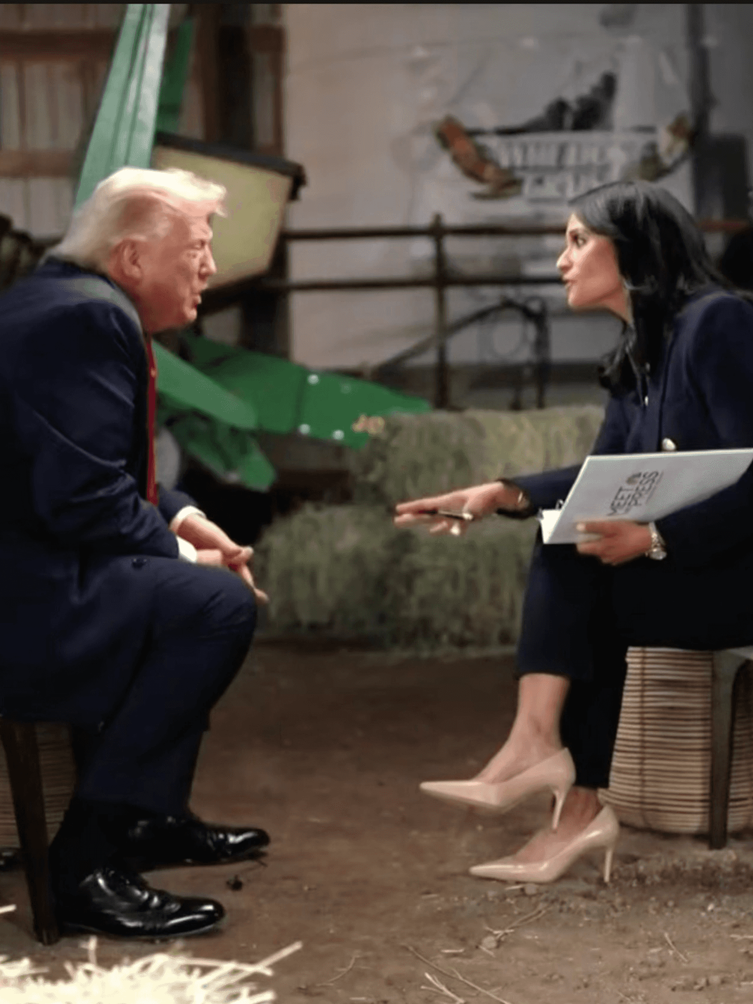 Donald Trump (left) and Kristen Welker (right) talk during a Meet the Press interview, with green tractors and hay bales visible around them.