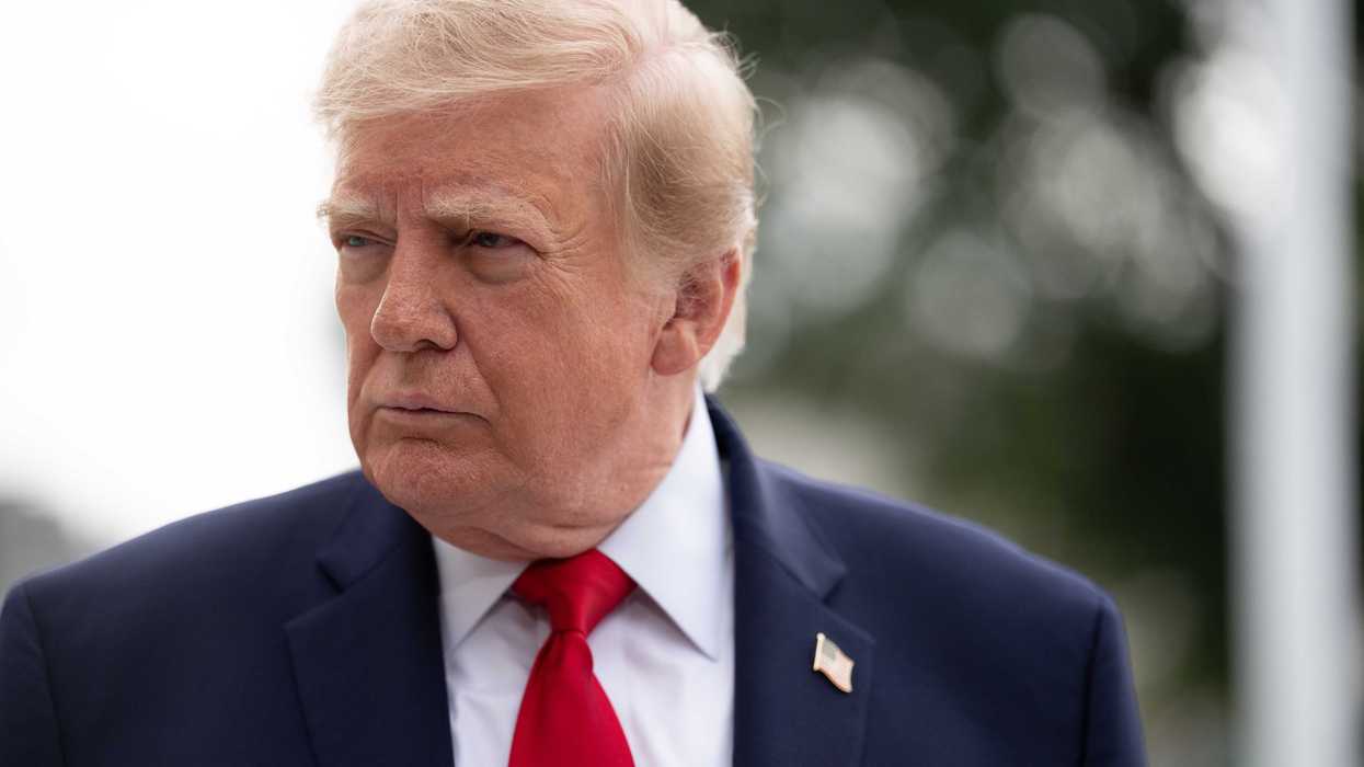 Donald Trump, looking to his right.