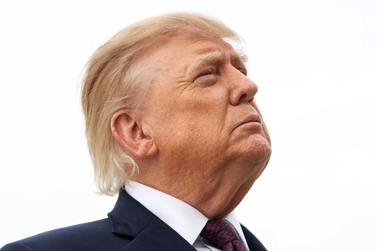Donald Trump looks upwards.
