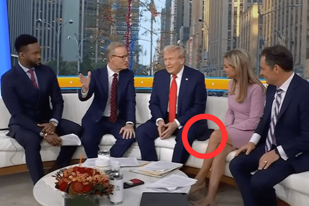 Donald Trump on the white Fox and Friends sofa, with a section of his suit jacket circled in red.