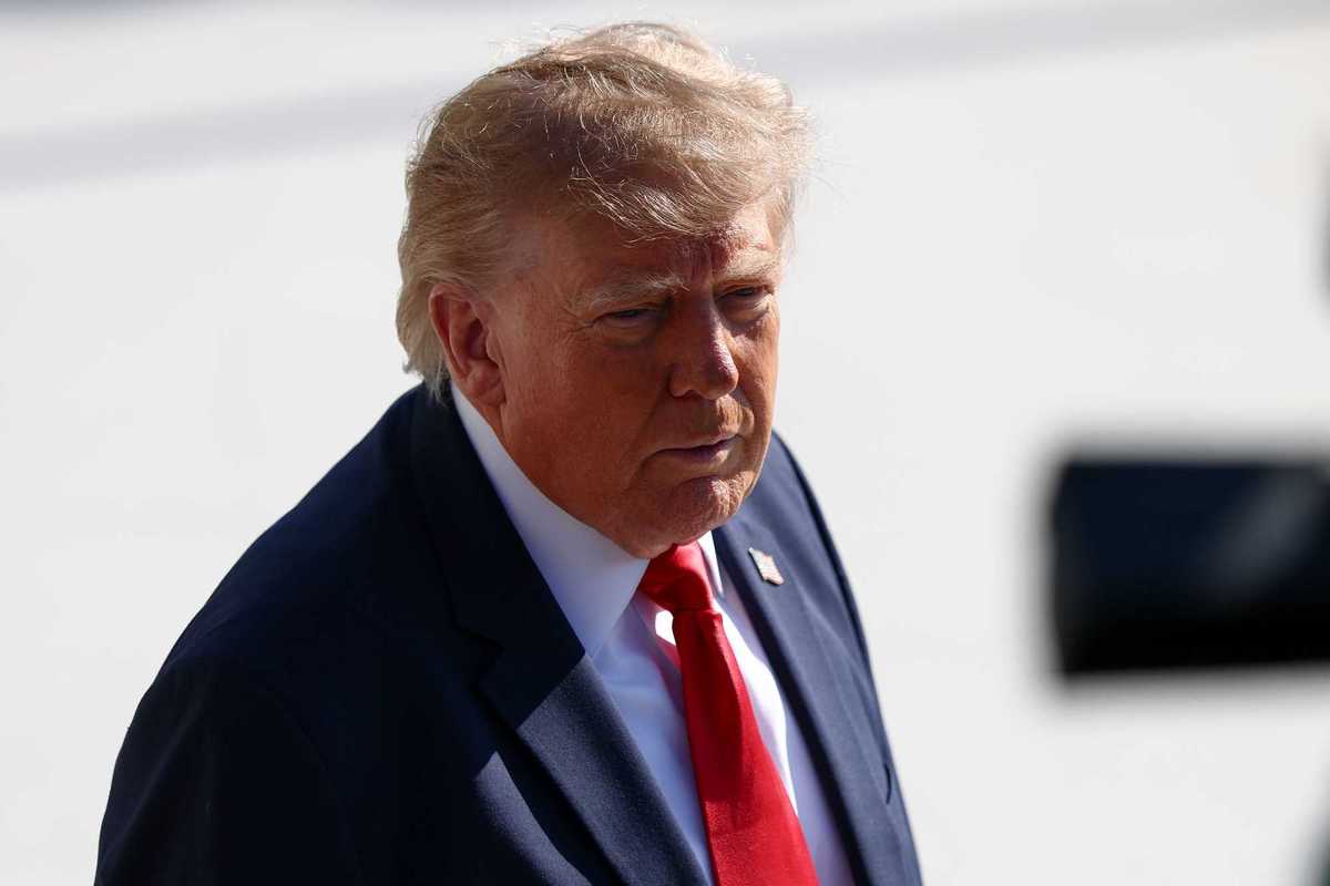 Donald Trump outside the White House talking to reporters.