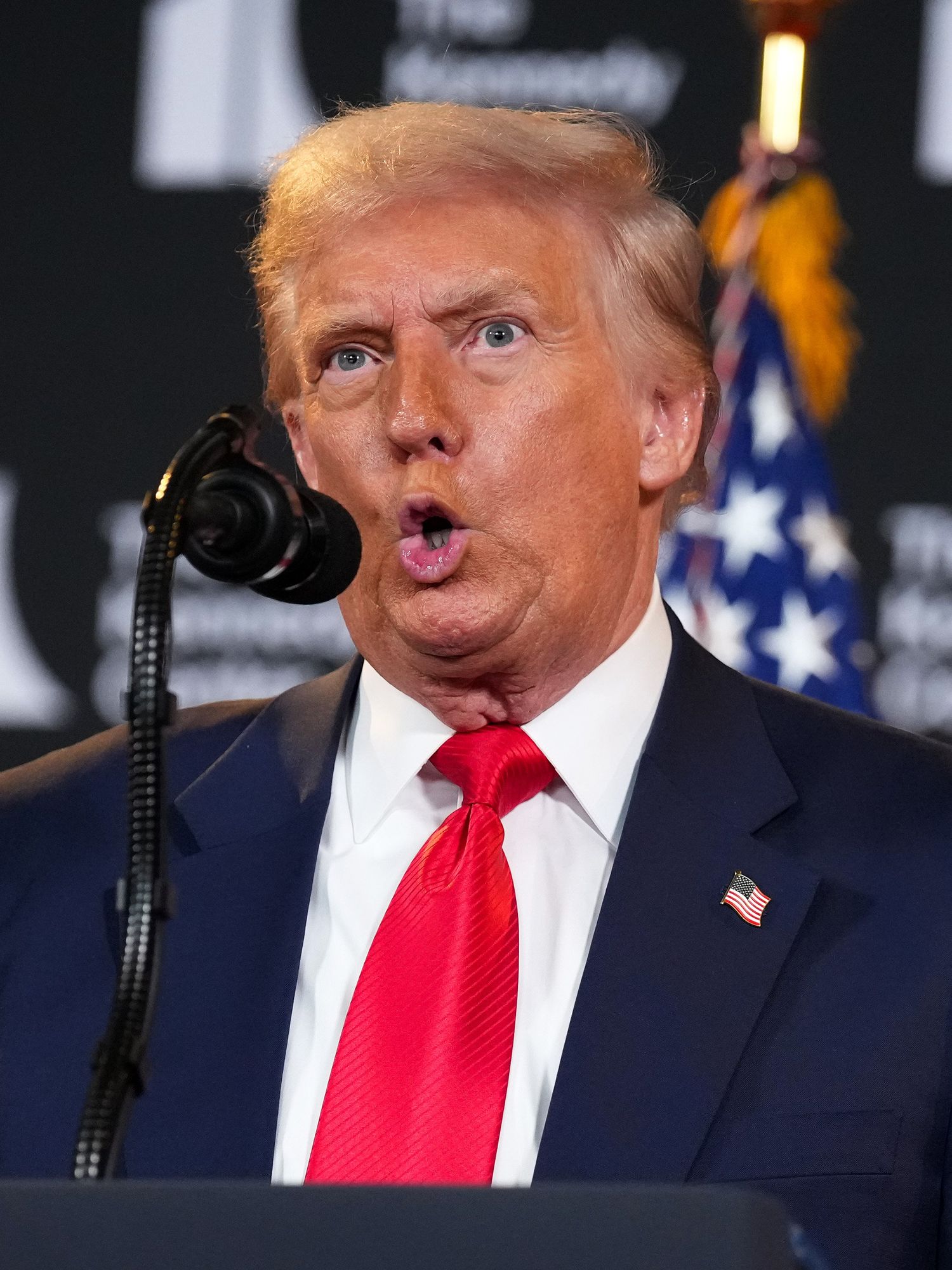 Donald Trump pulls a shocked expression mid-speech at the Kennedy Center.