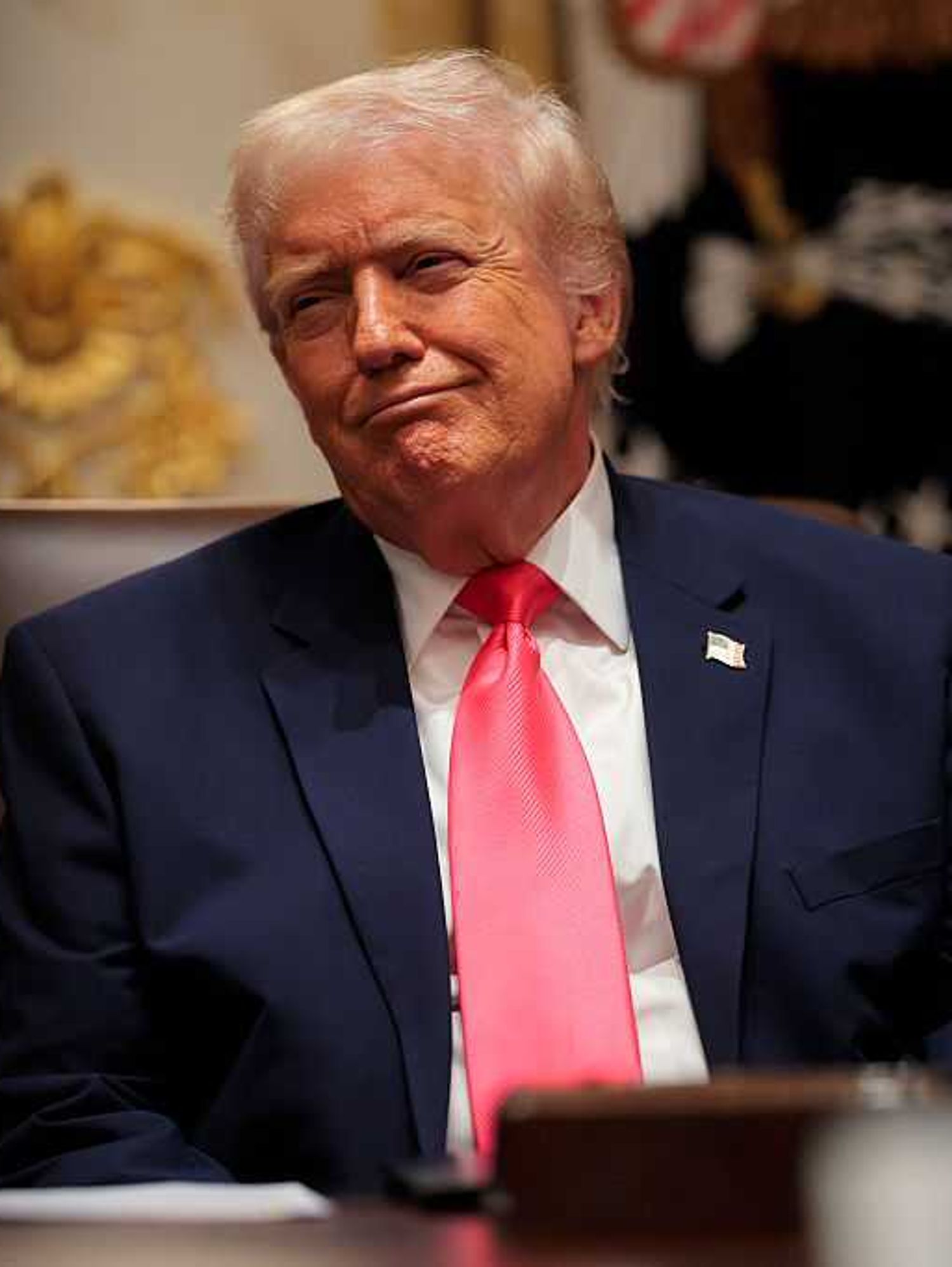 Donald Trump scrunches his face during a cabinet meeting.