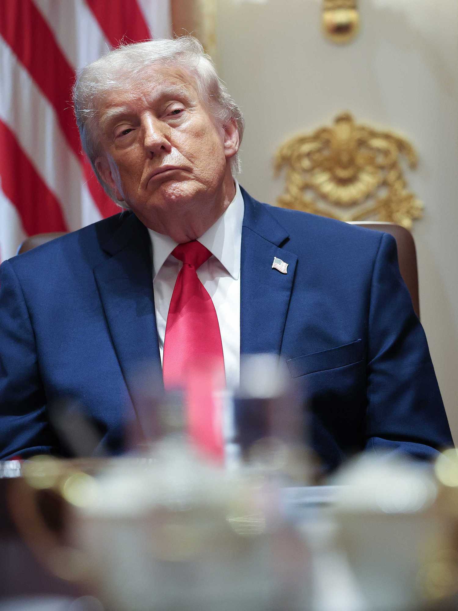 Donald Trump sitting in the Cabinet Room of the White House.