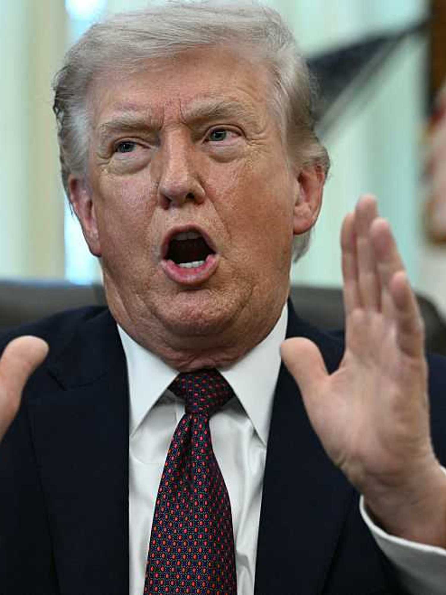 Donald Trump speaking in the Oval Office.