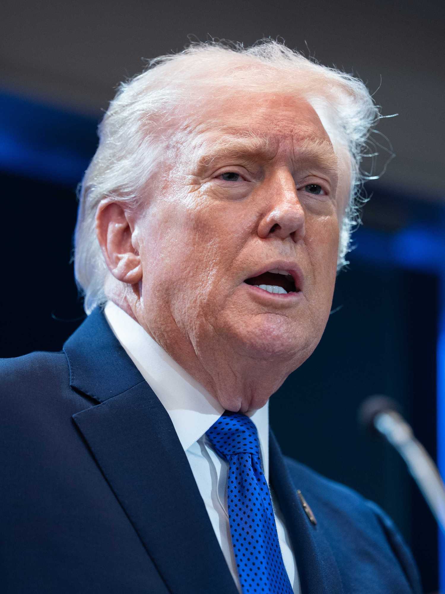 Donald Trump speaking to reporters during a press conference in the White House.