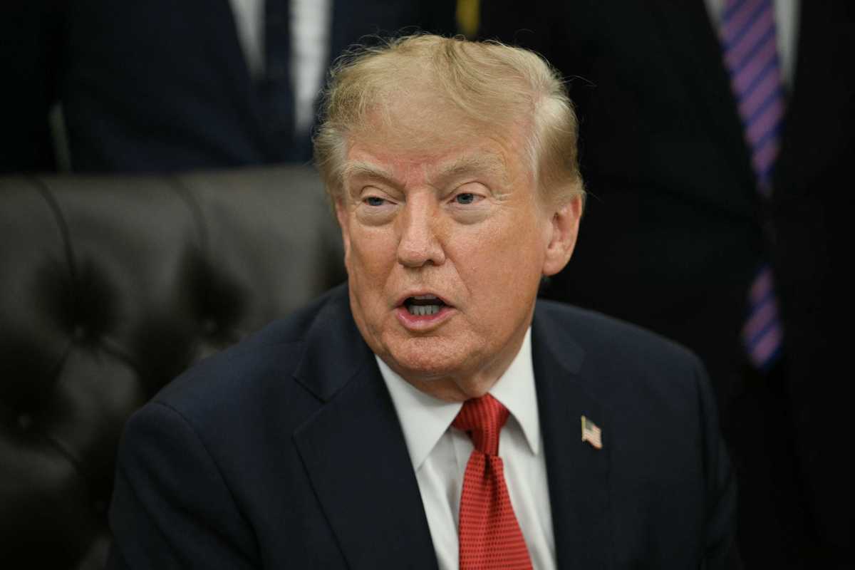 Donald Trump speaking to reporters in the Oval Office.