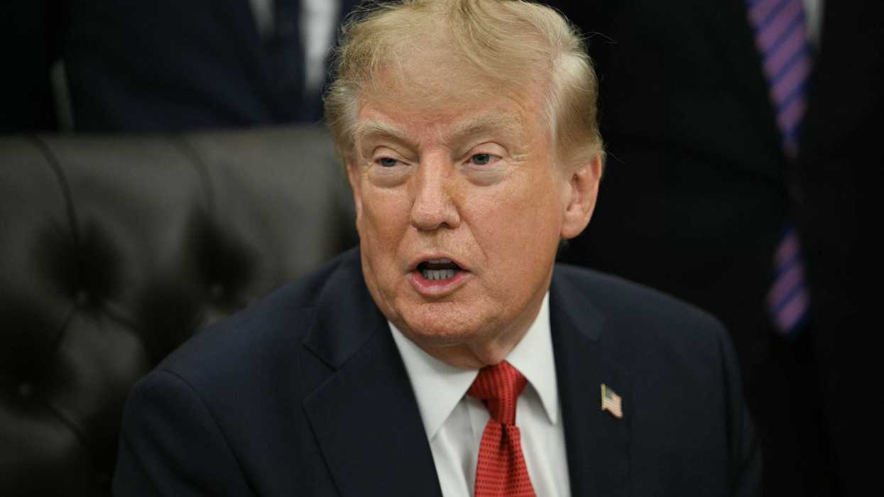 Donald Trump speaking to reporters in the Oval Office.
