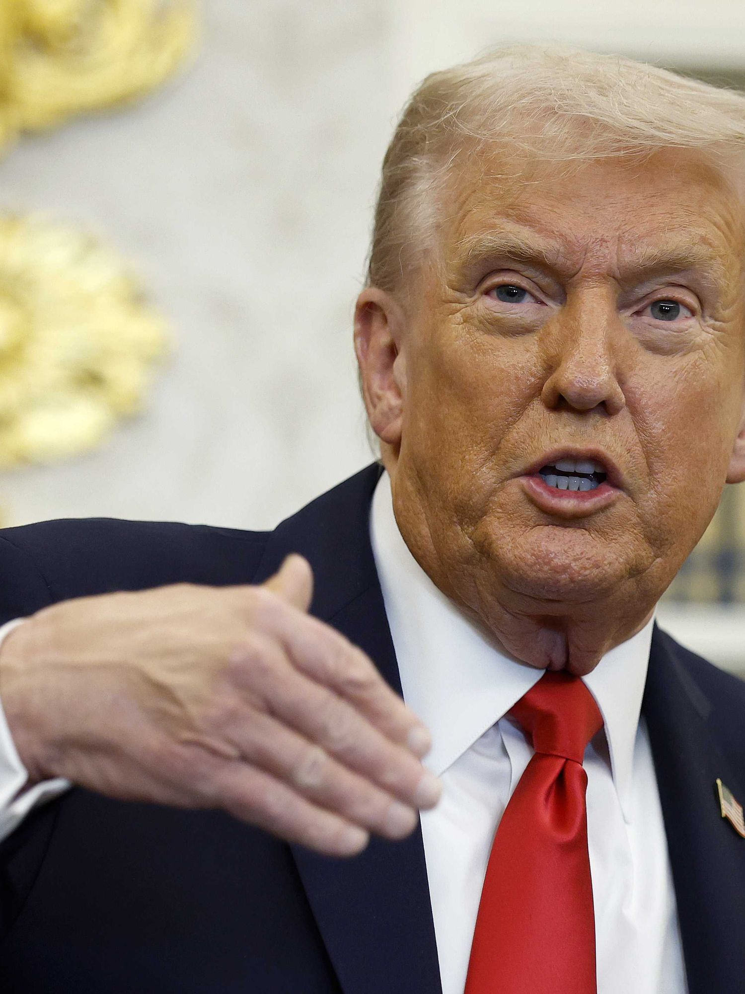 Donald Trump speaks in the Oval Office.