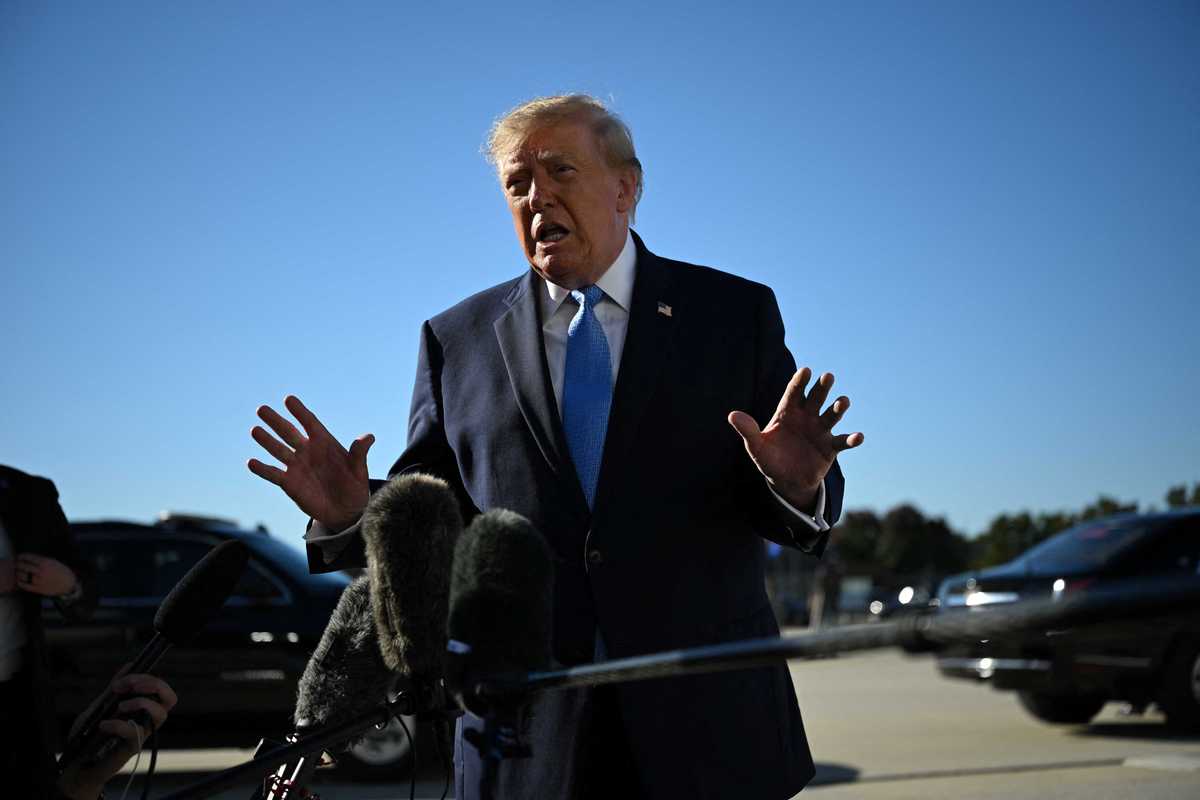 Donald Trump speaks to reporters at Joint Base Andrews in Maryland.