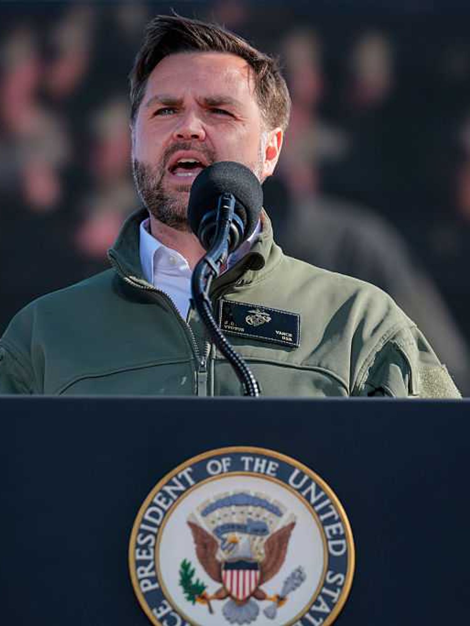Donald Trump speaks to troops behind the blue vice presidential lectern at Camp Pendleton, California.