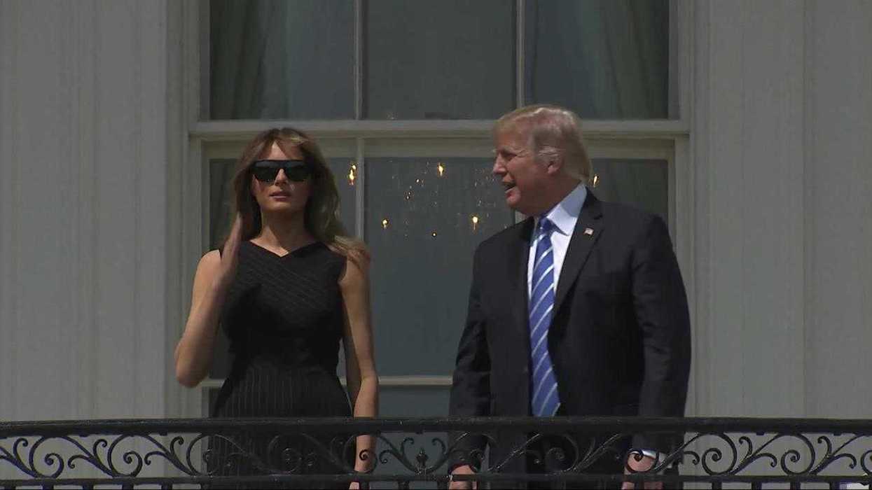 White House criticised as it reshares image of Trump looking directly at eclipse