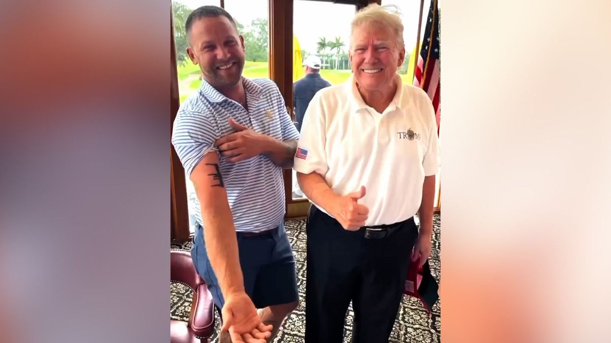 Donald Trump designs tattoo on fan's arm - but it's impossible to tell what it is