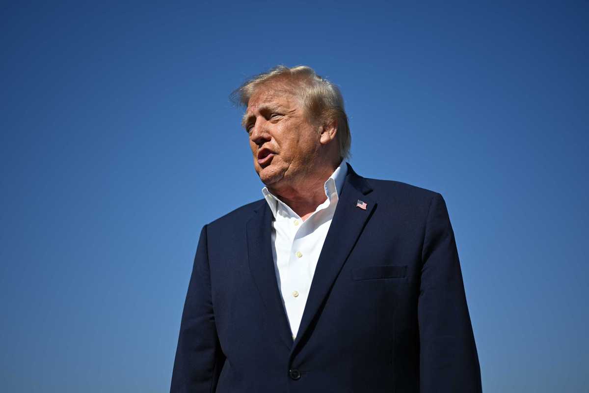 Donald Trump talks to reporters at Joint Base Andrews, Maryland.