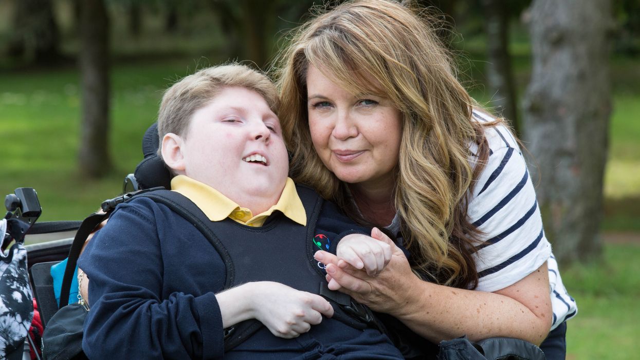 Donna Quinn with her son Logan at Craighalbert Centre, Cumbernauld (Robert Perry/PA)