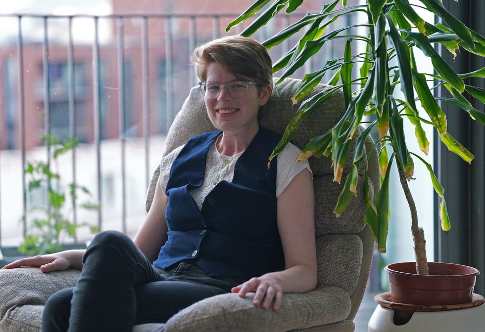 Dr Imogen Brooks sitting in a chair