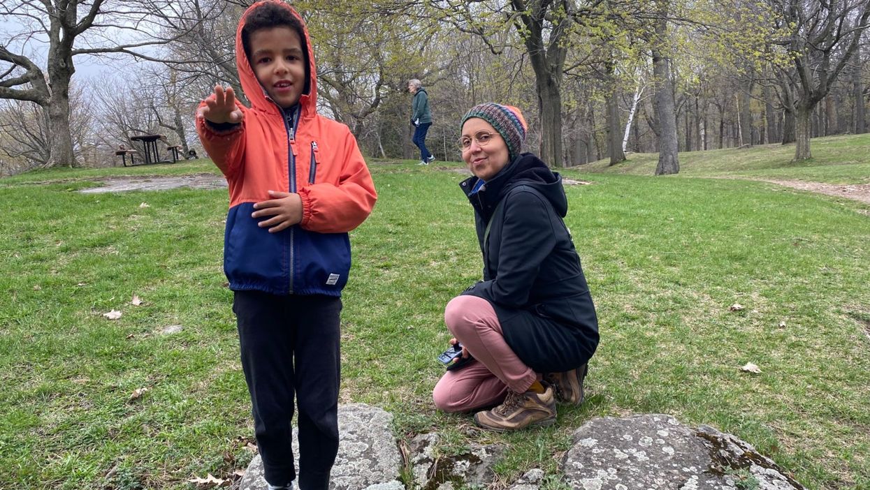 <p>Dr Nadia Chaudhri with her six-year-old son</p>