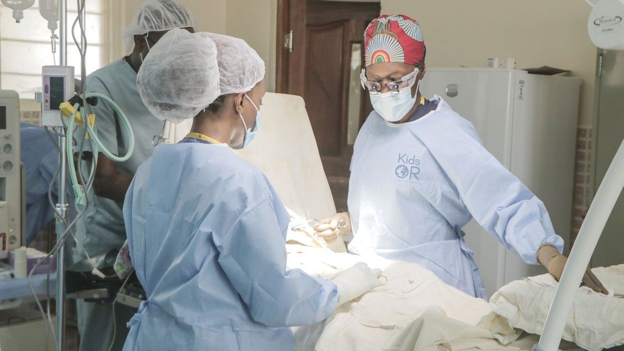 <p>Dr Neema Kaseje and surgical team</p>