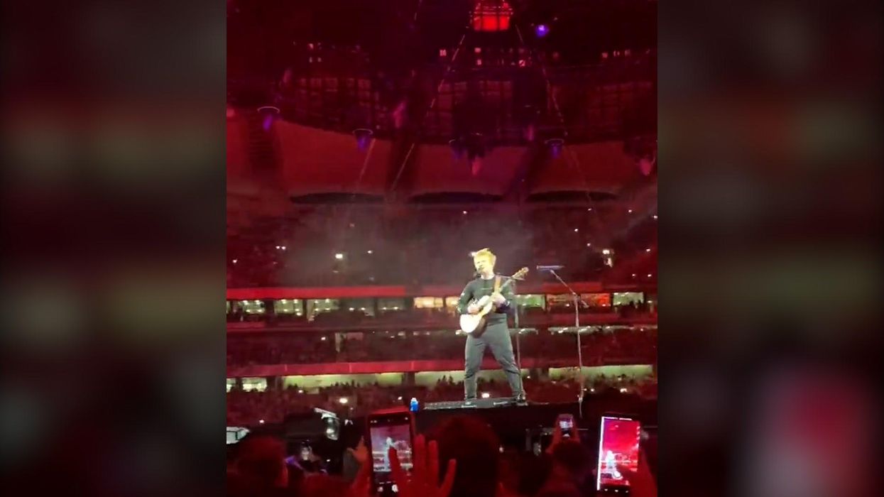 Fans left confused as Ed Sheeran zooms around on 'sushi belt' during concert