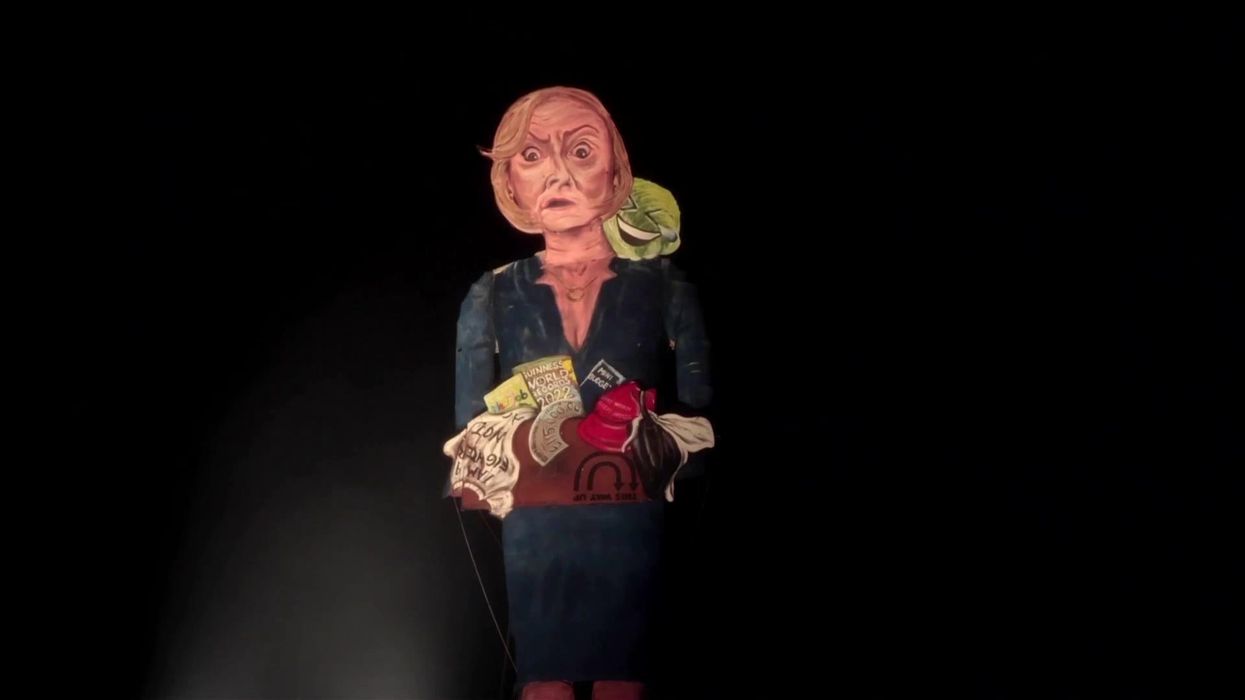 Watch a giant effigy of Liz Truss with a lettuce being burnt for bonfire night
