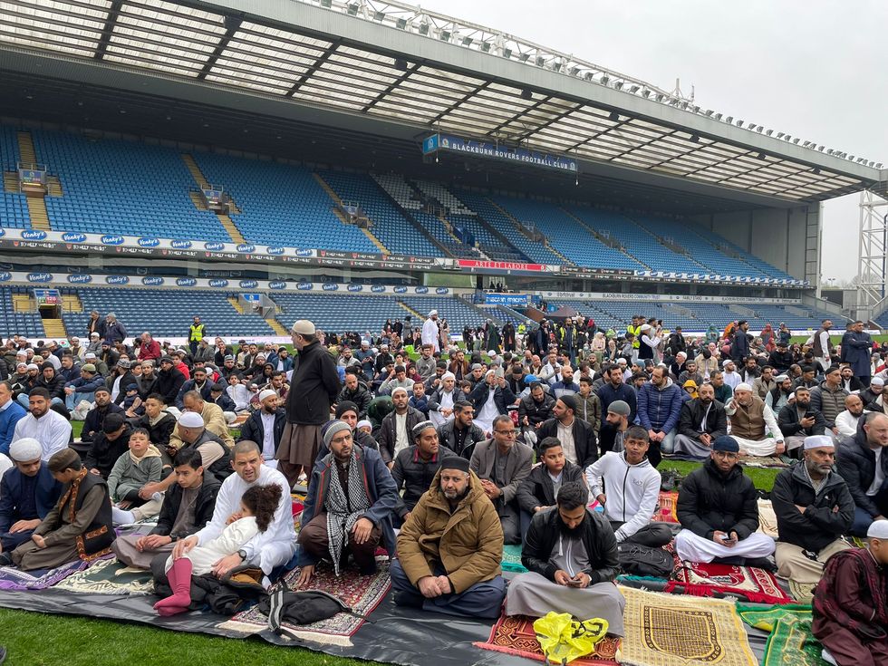 Muslims praise Blackburn Rovers for hosting Eid prayers on the pitch