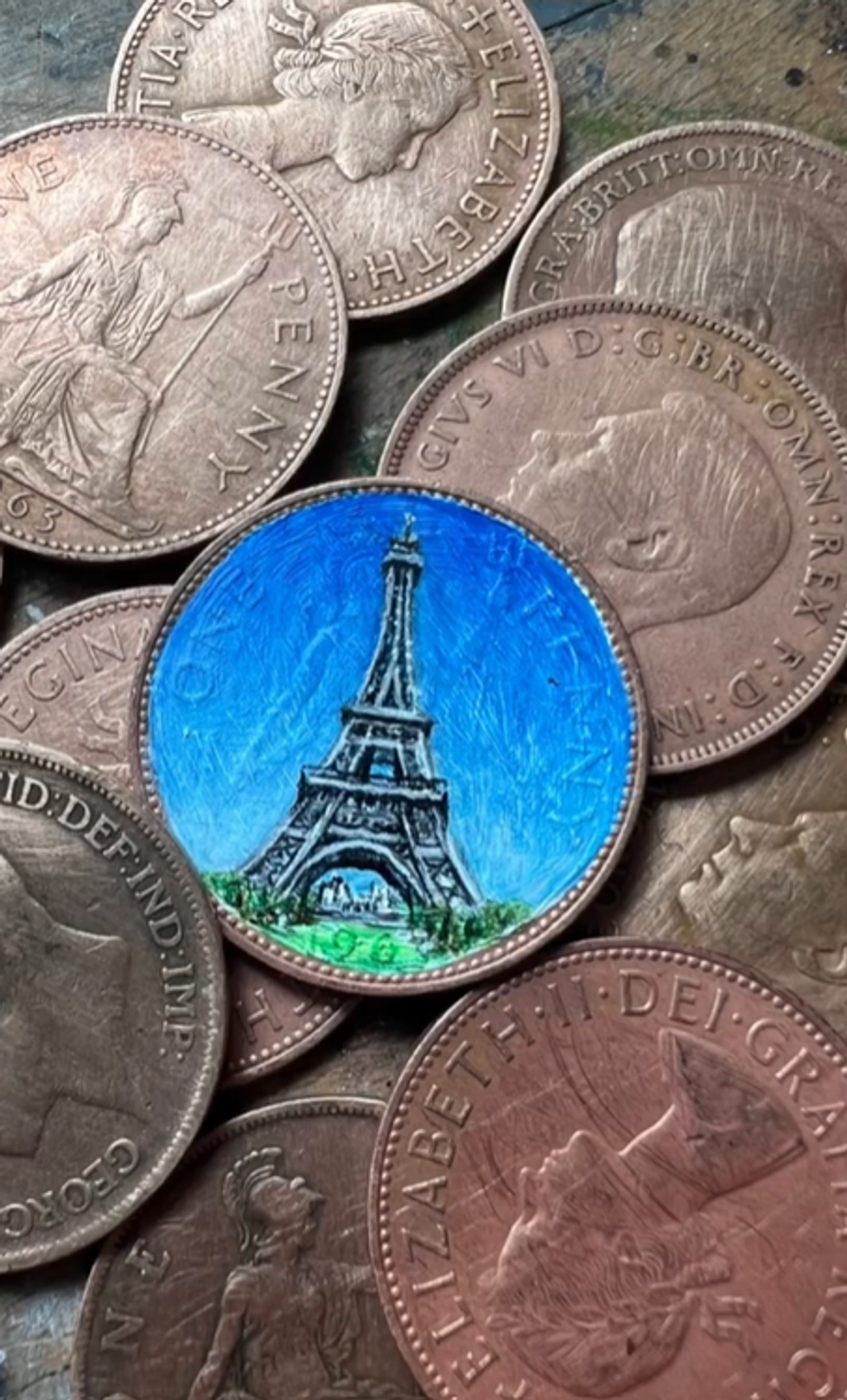 Eiffel Tower painted on a coin