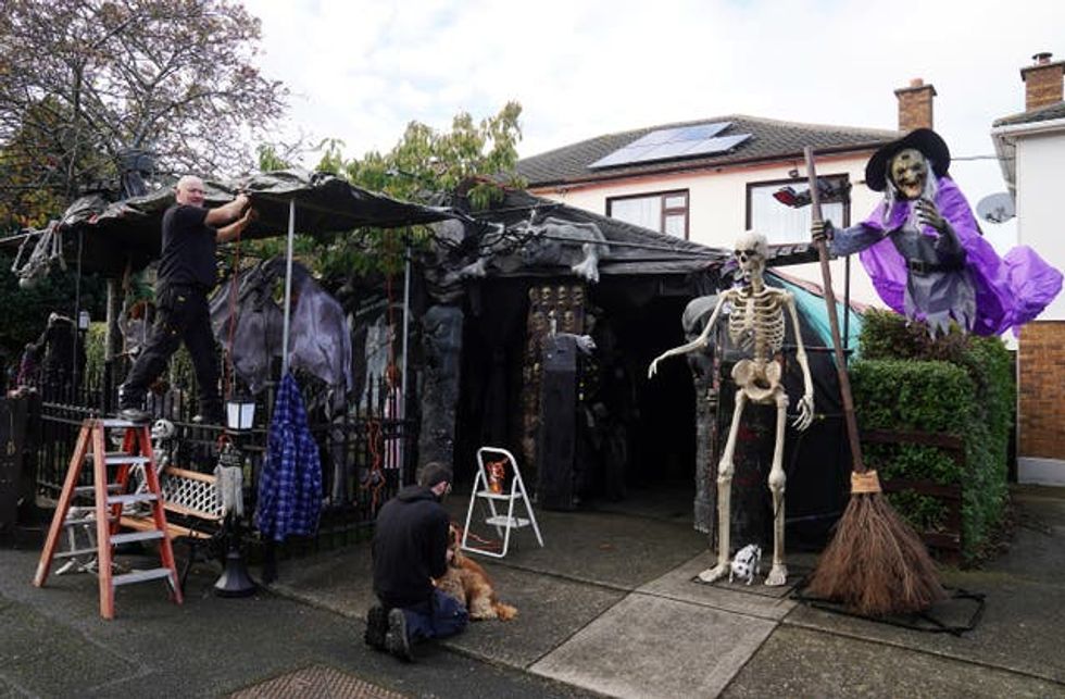 Electrician Ken Carraher continues preparations on his Halloween House of Horrors in Killiney, Dublin