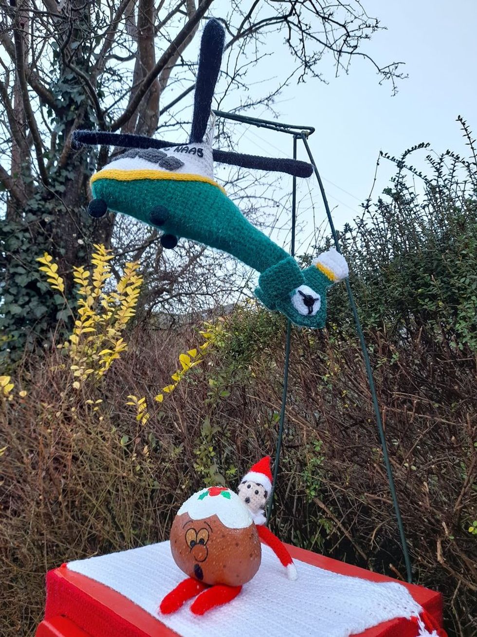 Elf with Christmas pudding